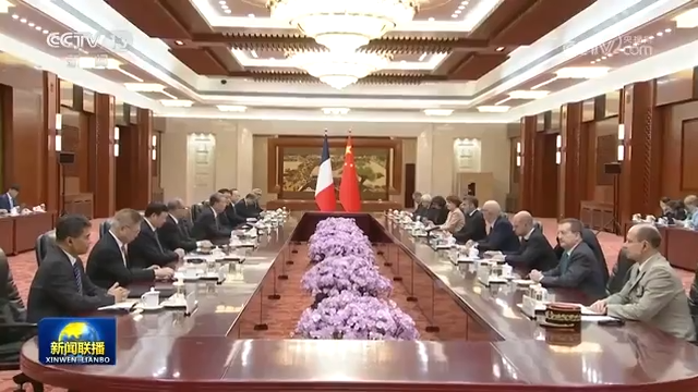 赵乐际会见法国总统